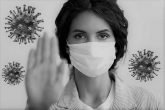 2378107 Stockphotoonbluebackgroundcloseupfocusonfemalefaceinmasklookingatcameraoutoffocusstretched16782605202 Ls