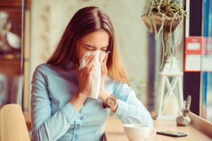 Flu Youngwomangotnoseallergyflusneezingnosesitting 3