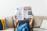 Womanreadingnewspaper