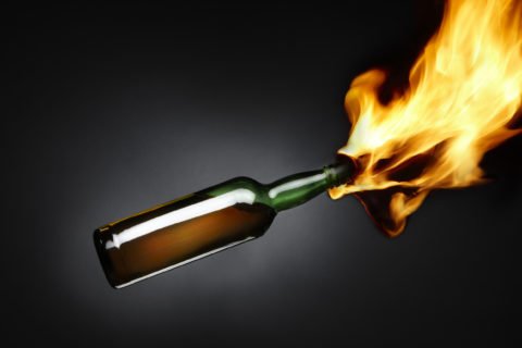 Molotovcocktaildepictsflamesshootingoutofbottlefilledwith 2