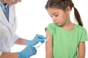 Pediatrician Doing Vaccine Injection To Kid Isolat 2023 02 15 05 21 34 Utc2