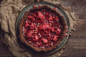 Halloween Food Homemade Pie With Jam And Scary Skull Shaped Pears Creative Treat For Halloween Party